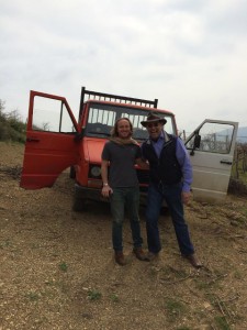 two men in front of truck